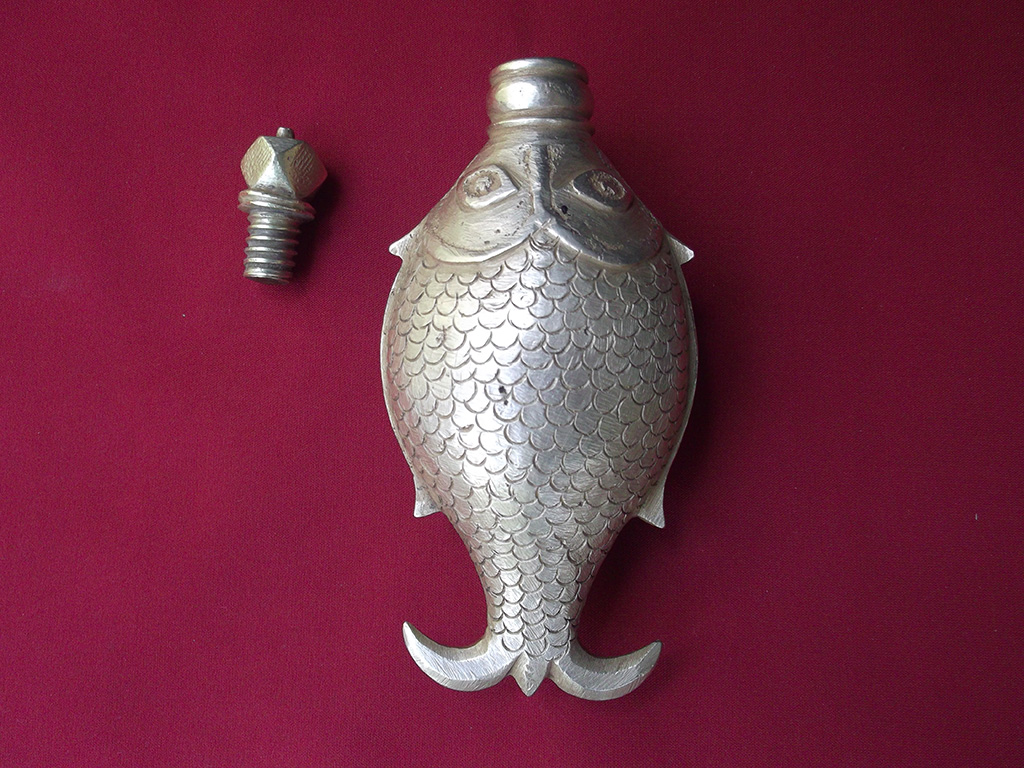 Fish and the cap shown separately.