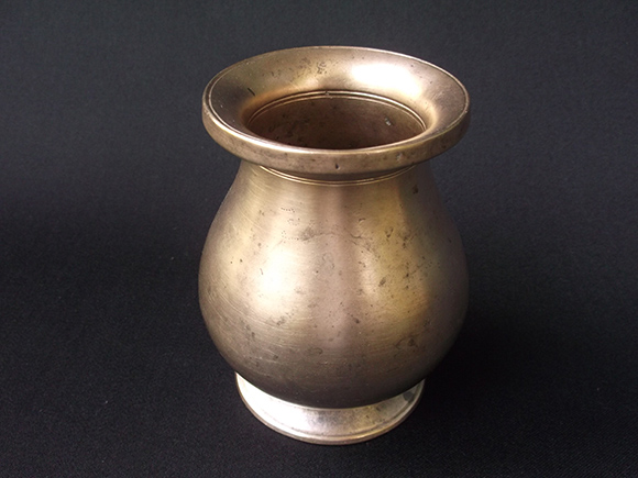 Top-view Antique Brass Drinking Pot. Size: Height 4.7”, Width at Bottom 3-2” Diameter, Width at the Belly 4.0” Diameter and Width at the Mouth 3.0” Diameter.