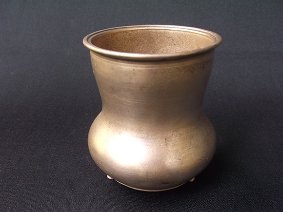 Top-view of Antique Brass Drinking Pot. Size: Height 3.2”, Width at Bottom 2.5” Diameter, Width at the Belly 3.4” Diameter and Width at the Mouth 3.0” Diameter.
