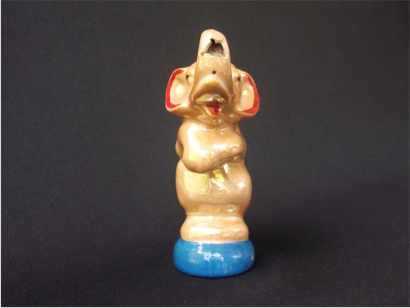 Antique elephant showing wide ears with red colour lining and base in blue colour