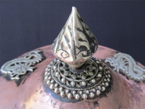 The intricate design work on the knob and the base of the knob