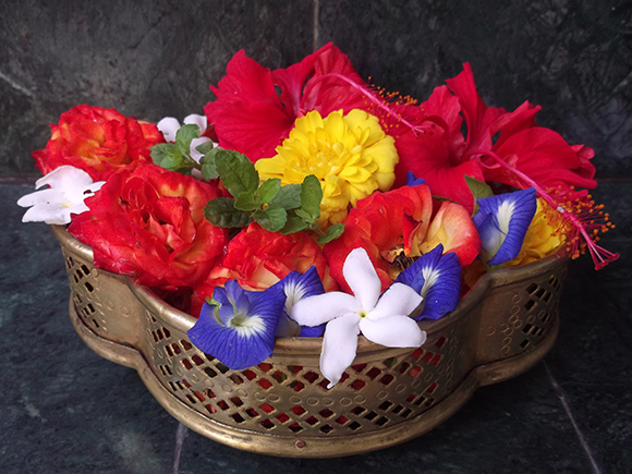 Antique Brass Flower Basket with Four Semi-circular Sides with Flowers for Pooja.