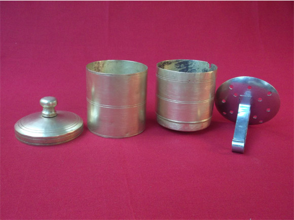 Complete coffee filter assembly- Lower chamber, upper chamber, lid and plunger.(The stainless steel plunger is not a part of the antique brass filter but shown as a model)