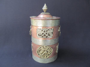 Mystical copper vessel with 3 white metal strips, dragon embellishments and the lid with the knob