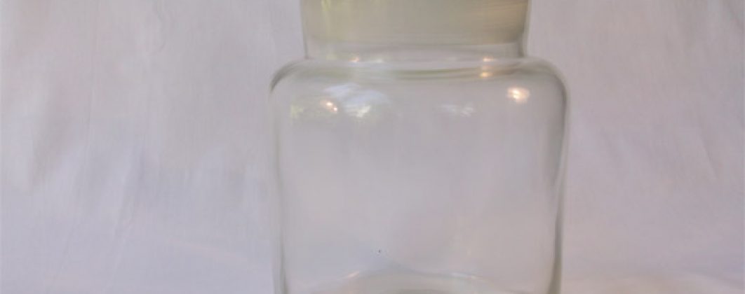 Antique glass jar with lid