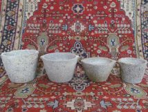 of beautifully shaped antique Granit storage pots
