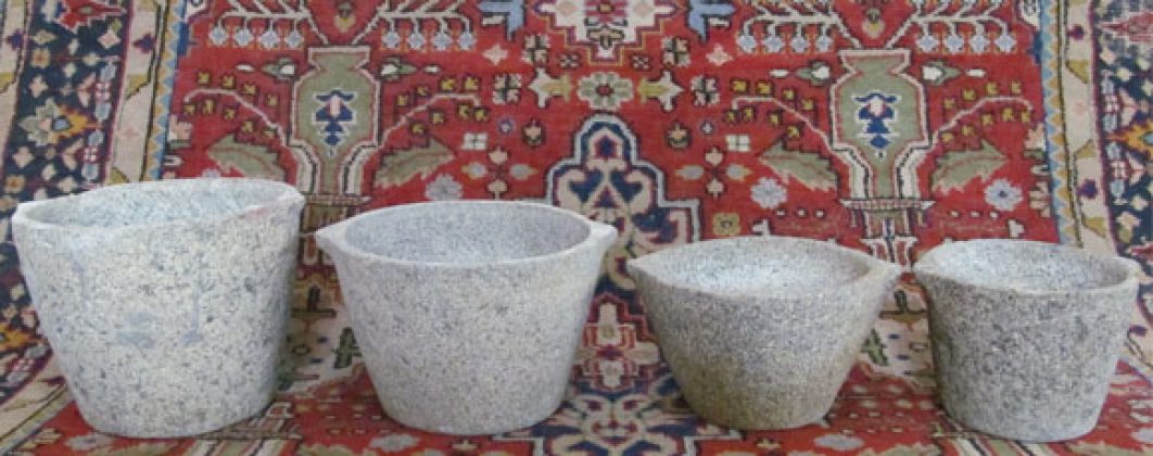 of beautifully shaped antique Granit storage pots